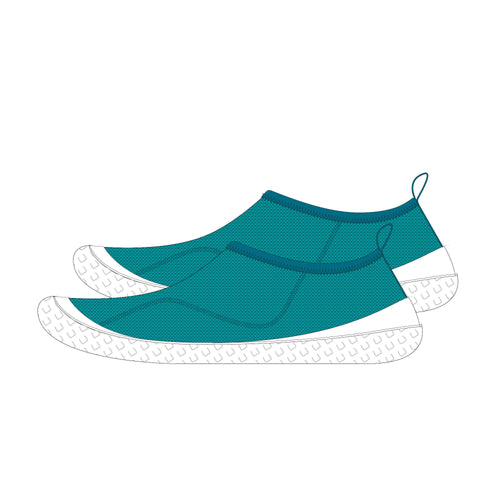 A photo of the Kids' Aquashoes 100 Turquoise in use
