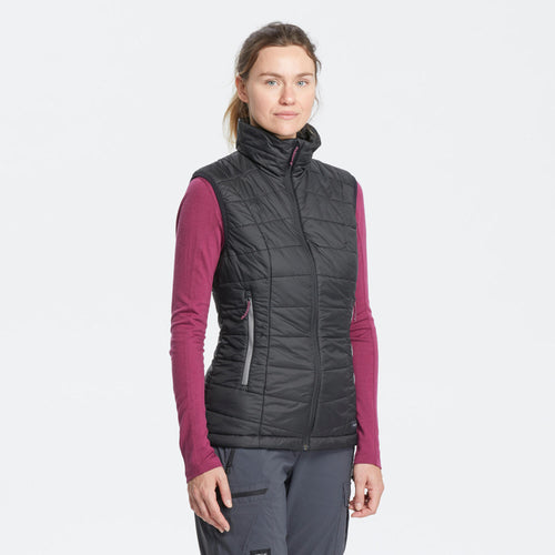 A photo of the Forclaz Women's MT100 Synthetic Puffer Vest in use