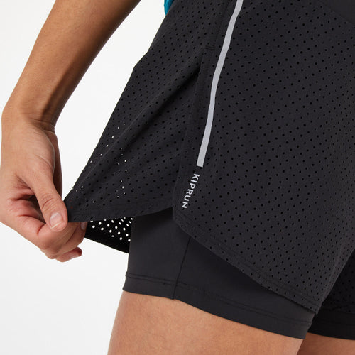 A photo of the Kiprun 2-in-1 Running Shorts Women's in use
