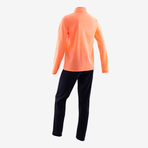 A photo of the Domyos Gym'y S500 Warm Breathable Synthetic Gym Tracksuit Girls' in use