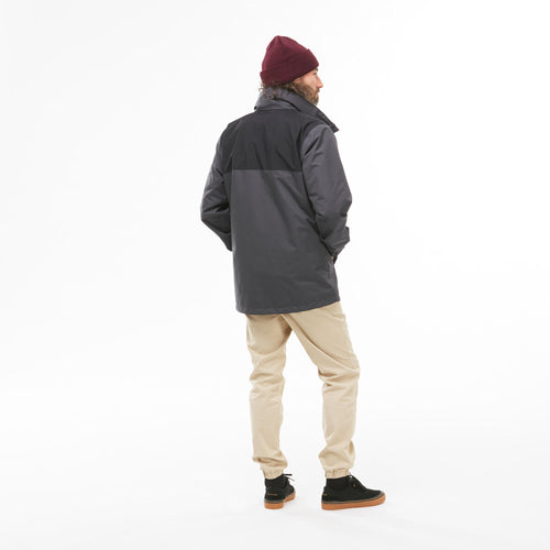 A photo of the Men's 3-in-1 Waterproof Travel Backpacking Jacket Travel 100 32°F - Grey in use