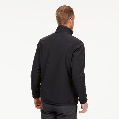 A photo of the Windbreaker jacket - softshell - warm - MT100 WINDWARM - men's in use