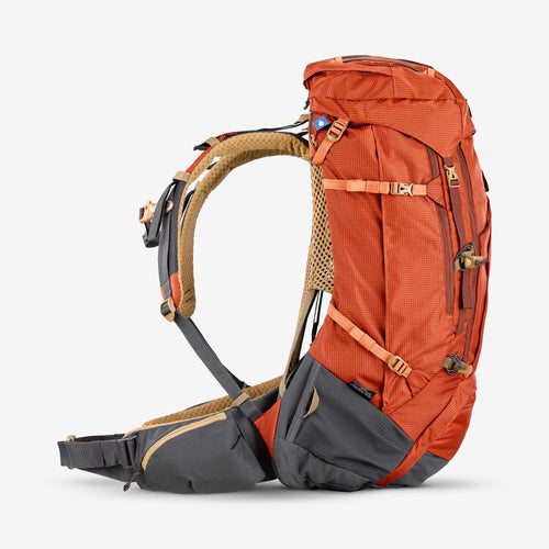 A photo of the Simond Men's MT500 Air 60 + 10 L Backpacking Pack in use