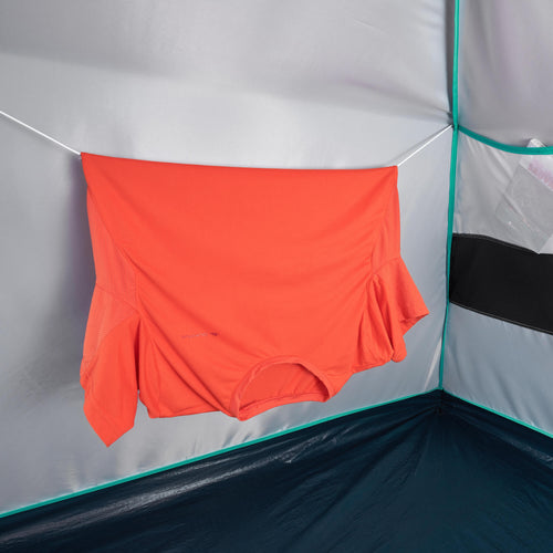 A photo of the Quechua MH100 Waterproof Camping Tent 2 Person in use