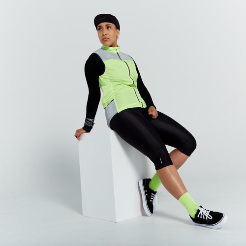 A photo of the Triban EN1150 Windbreaker Visibility Cycling Vest Women's in use