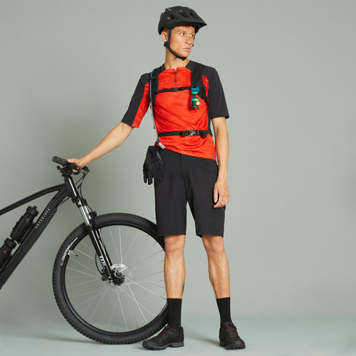 A photo of the Men's MTB Biking Shorts EXPL 500 - Black in use