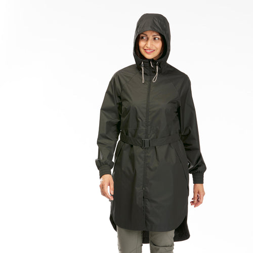 A photo of the Quechua Women's Long Waterproof Rain Jacket in use