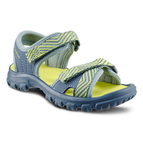 A photo of the Quechua MH100 Hiking Sandals Kids' in use