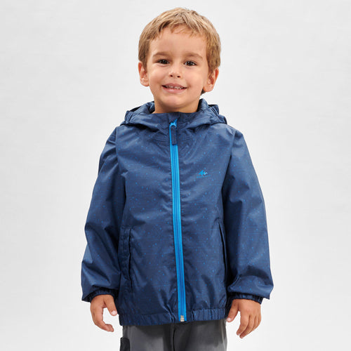 A photo of the Quechua MH500 Waterproof Hiking Jacket Kids' in use