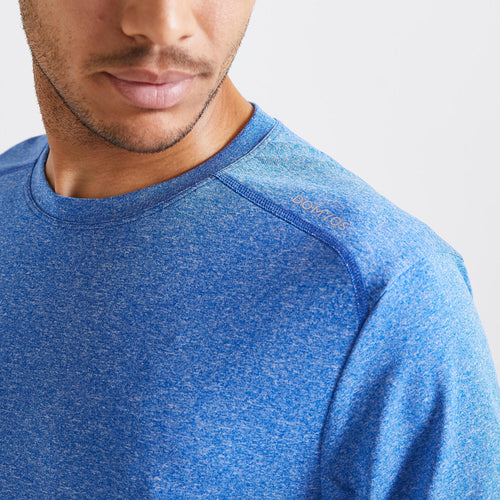 A photo of the Men's Breathable Crew Neck Essential Fitness T-Shirt - Mottled Grey in use