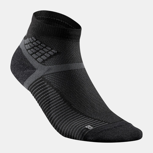A photo of the Quechua Hike 500 Mid Hiking Socks - 2 Pairs in use