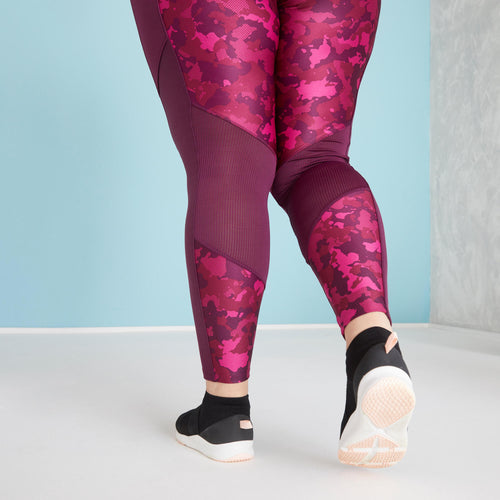 A photo of the Fitness Leggings with Phone Pocket (Plus Size) in use