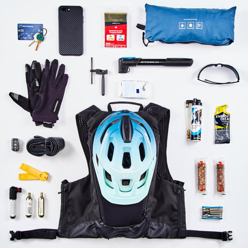 A photo of the Mountain Bike Hydration Backpack Explore 7L 2L Water - Black in use