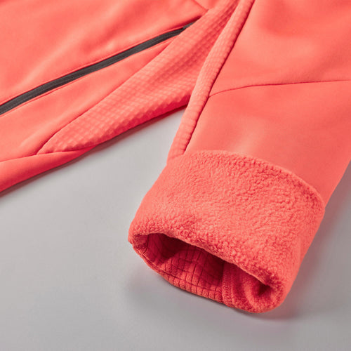 A photo of the Quechua Women's MH520 Hooded Fleece Jacket in use