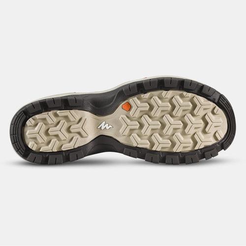 A photo of the Quechua NH120 Leather Hiking Sandals Women's in use