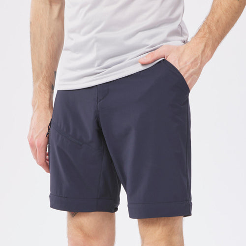A photo of the Men's Modular Hiking Pants - MH150 in use