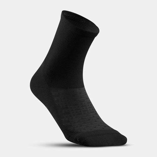 A photo of the Quechua Hike 100 High Socks 2-Pack in use