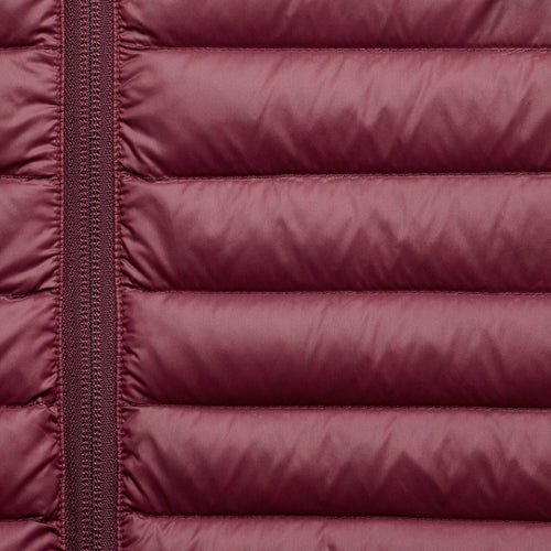 A photo of the Forclaz Men's MT100 Down Jacket in use