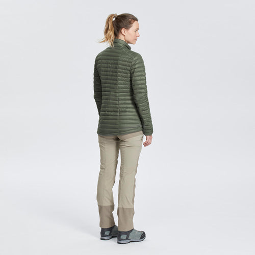 A photo of the Forclaz Women's MT100 Down Puffer Jacket in use