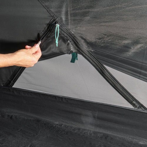 A photo of the Quechua MH100 Fresh & Black Waterproof Camping Tent 2 Person in use