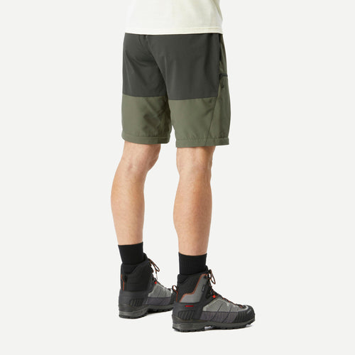 A photo of the Simond Forclaz Men's MT500 2-in-1 Zip-Off Hiking Pants in use