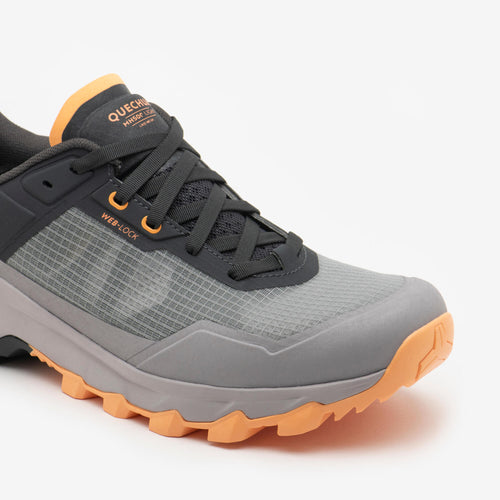 A photo of the Quechua Men’s MH500 Light Hiking Shoes in use