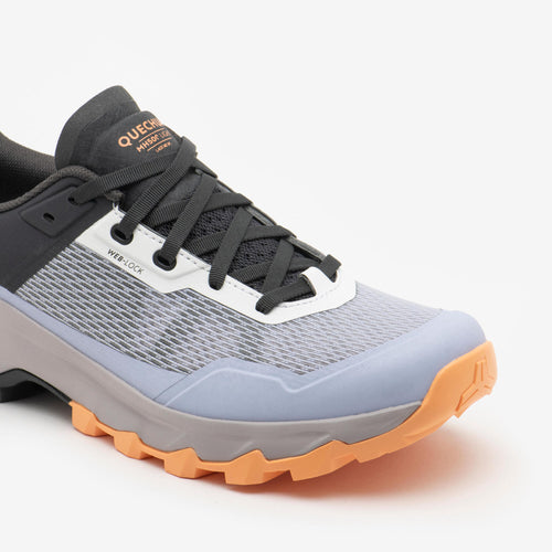 A photo of the Quechua Women's MH500 Light Hiking Shoes in use