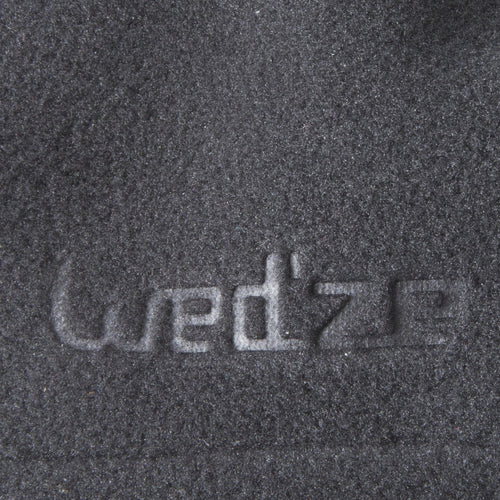 A photo of the ADULT SKI FLEECE NECK-WARMER - TANKA - BLACK in use