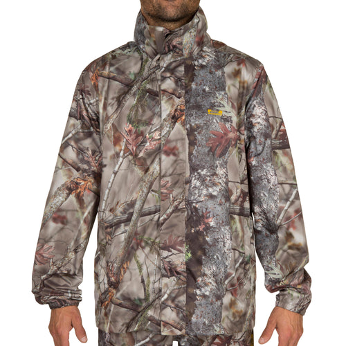 A photo of the Solognac Actikam 100 Waterproof Camouflage Hunting Jacket Adult in use