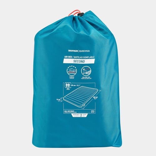 A photo of the Quechua Air Seconds 55'' Quick Inflating Air Mattress Camping Bed 2-Person in use