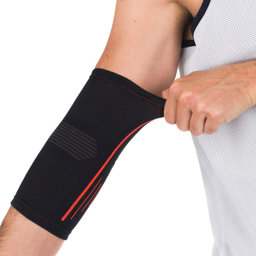 A photo of the Tarmak Soft 300 Right/Left Elbow Support Adult in use