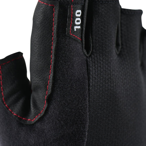 A photo of the Domyos 100 Weight Training Gloves in use