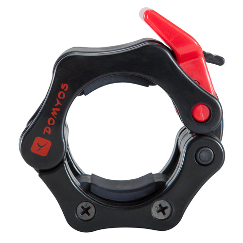 A photo of the Olympic 2" Barbell Quick Release Collars in use