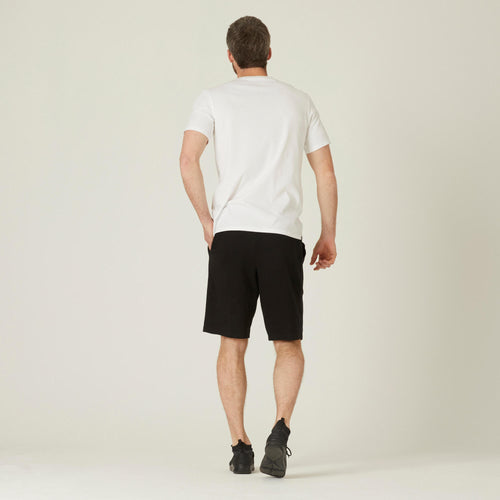 A photo of the Nyamba 500 Long Sports Shorts Men's in use