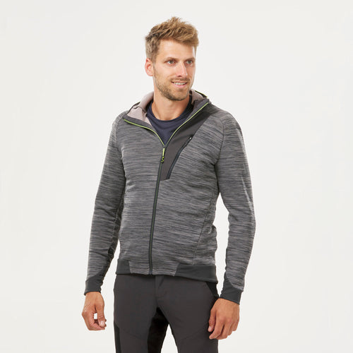 A photo of the Quechua MH900 Hiking Fleece Jacket Men's in use