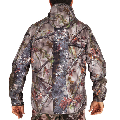 A photo of the Hunting 500 Silent Waterproof Jacket - WOODLAND CAMOUFLAGE in use