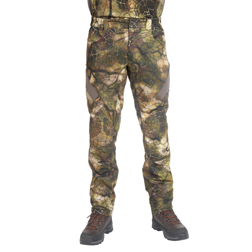 A photo of the Solognac Furtiv 900D Silent Breathable Hunting Pants Men's in use