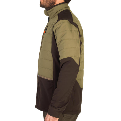 A photo of the Solognac 500 Hybrid Puffer Hunting Jacket Men's in use