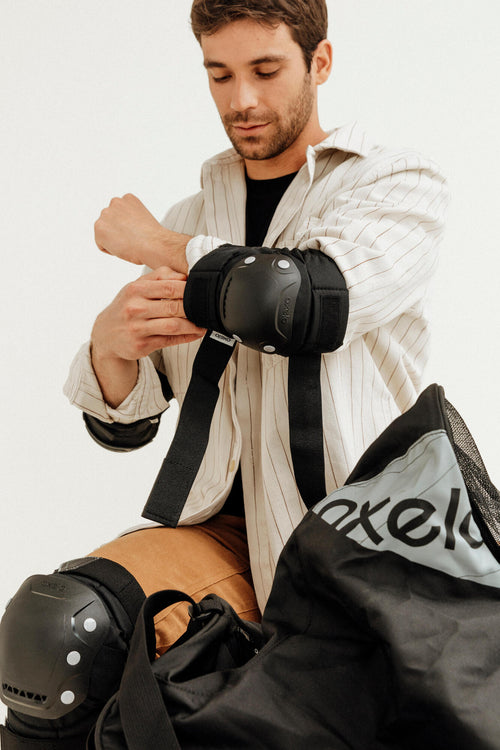A photo of the Oxelo FIT500 Protective Gear Set w Knee Elbow Pads & Wrist Guard Adul in use