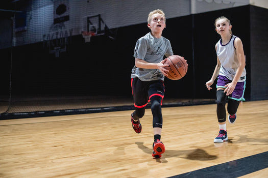 Tarmak B10T0 Beginner Basketball Size 5, blood orange Image 1 of 3