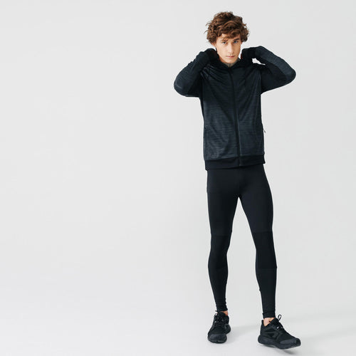 A photo of the Kalenji Run Warm+ Running Jacket Men's in use