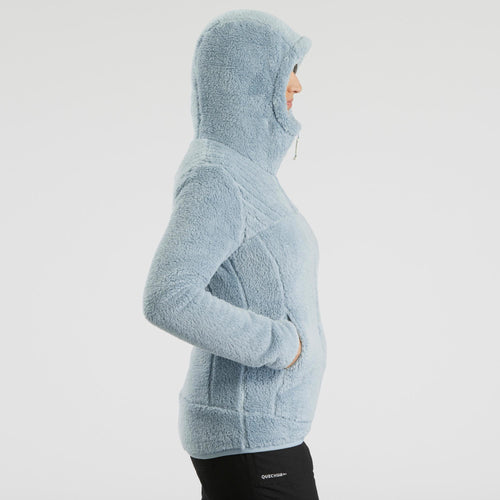 A photo of the Women's Warm Fleece Hiking Jacket - SH100 ULTRA-WARM in use