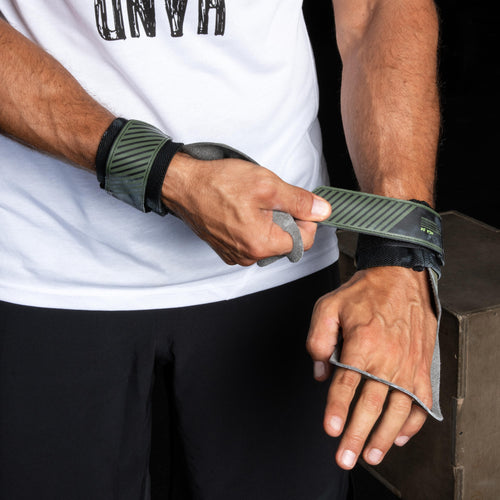 A photo of the Domyos 4-Fin Cross Training Hand Grip in use