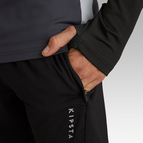 A photo of the Kipsta T500 Soccer Pants Men's in use