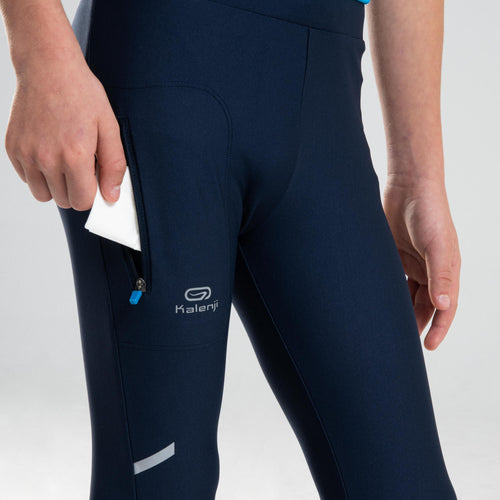 A photo of the Kalenji AT100 Cropped Athletics Pants Kids' in use