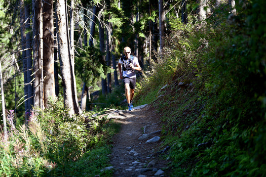 10L TRAIL RUNNING BAG UNISEX - BLACK/BRONZE - Sold with 1L water bladder, black Image 1 of 5