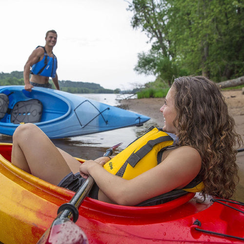 A photo of the Onyx Movevent Curve Adjustable Life Jacket PFD Adult User >90lb in use