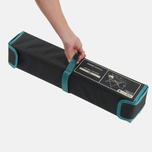 A photo of the Quechua MH100 Low Folding Camping Table in use