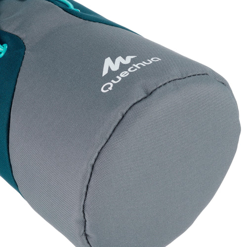 A photo of the Quechua Isothermal Cover for 1.2 to 1.5 Liter Hiking Bottles in use