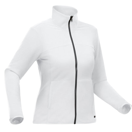 A photo of the Women's Travel Trekking Waterproof 3-in-1 Jacket - Travel 100 0 degrees Celcius White in use